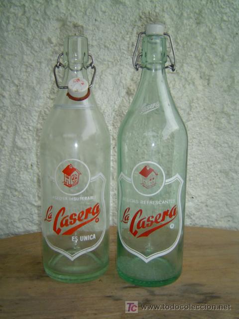 Botellas antiguas: 2 DE LA CASERA DIFERENTES - Foto 1