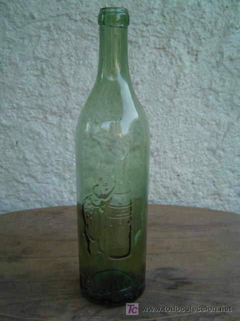 Botellas antiguas: BOTELLA CO&Ntilde;AC CABALLERO LETRAS EN RELIEVE - Foto 1