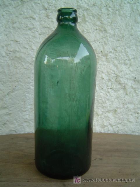 Botellas antiguas: BOTELLA COLOR VERDE N&ordm; EN RELIEVE EN LA BASE - Foto 1