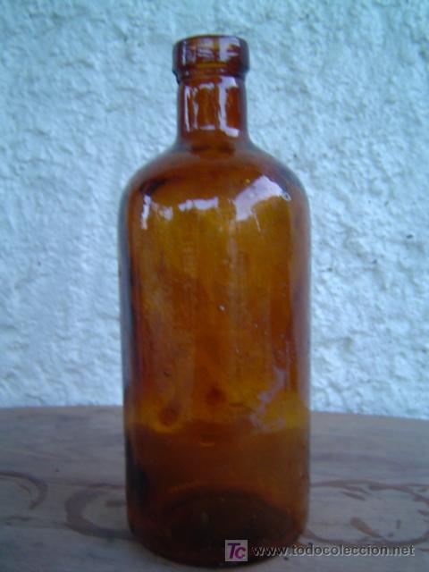 Botellas antiguas: BOTELLA  MEDIDAMENTO COLOR MARRON - Foto 1
