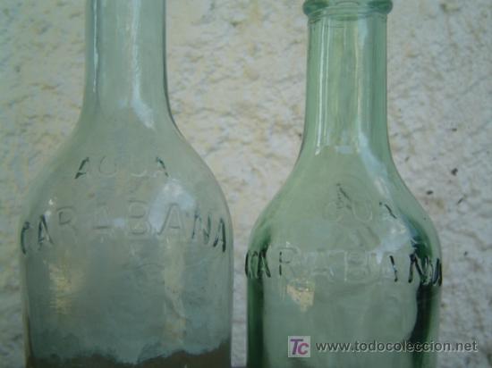 Botellas antiguas: 2 BOTELLAS CARABA&Ntilde;A LETRAS EN RELIEVE - Foto 2