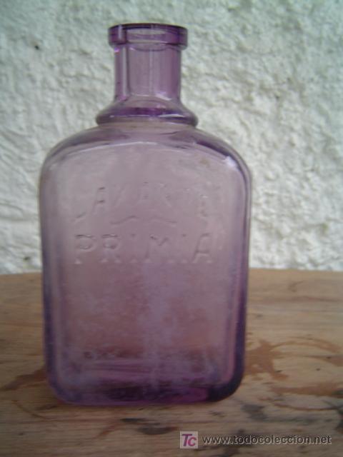 Botellas antiguas: BOTELLA LAXANTE PRIMA LETRAS EN RELIEVE - Foto 1