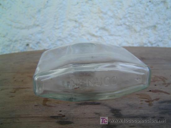Botellas antiguas: BOTELLA PERFUME NENUCO LETRAS EN RELIEVE EN LA BASE - Foto 2
