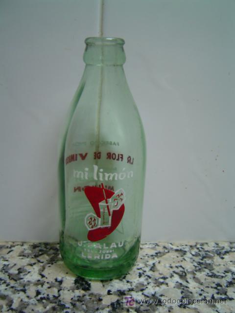 Botellas antiguas: BOTELLIN MI LIMON - Foto 1