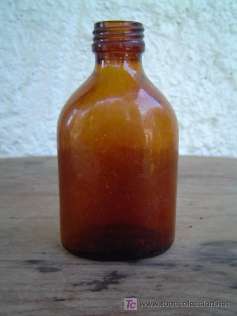 Botellas antiguas: BOTELLA MEDICAMENTO LORENZINI LETRAS EN RELIEVE EN LA BASE - Foto 1