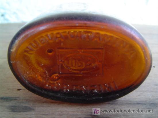 Botellas antiguas: BOTELLA MEDICAMENTO LORENZINI LETRAS EN RELIEVE EN LA BASE - Foto 2