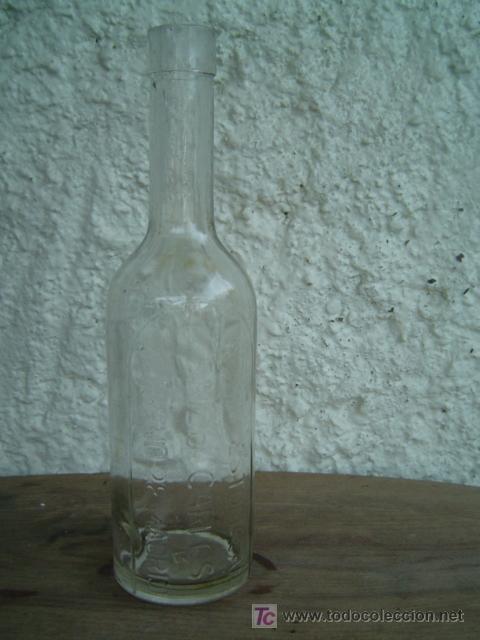 Botellas antiguas: BOTELLA ELIXIR   ESTOMACAL SAEZ DE CARLOS  SERRANO 28 MADRID - Foto 1