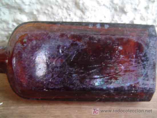 Botellas antiguas: BOTELLA LABORATORIOS EMERCK LETRAS EN RELIEVE - Foto 2