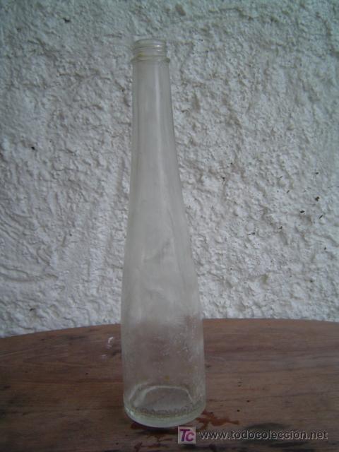 Botellas antiguas: BOTELLA LABORATORIOS DEL DR. MADARIAGA LETRAS EN RELIVE - Foto 1