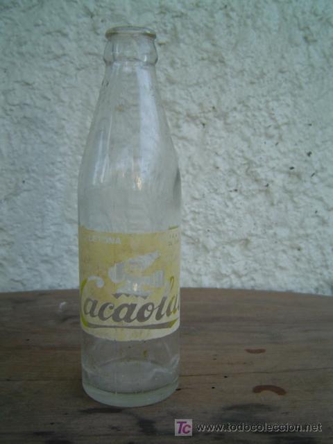 Botellas antiguas: BOTELLIN CACAOLAT SEREGRAFIADO - Foto 1