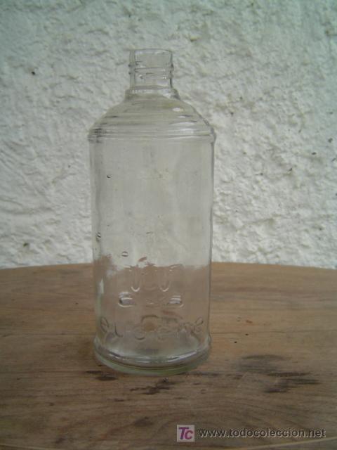 Botellas antiguas: BOTELLA EUGENE LETRAS EN RELIEVE - Foto 1