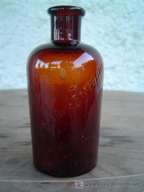 Botellas antiguas: BOTELLA LABORATORIO THERAPIA LETRAS EN  RELIEVE - Foto 1