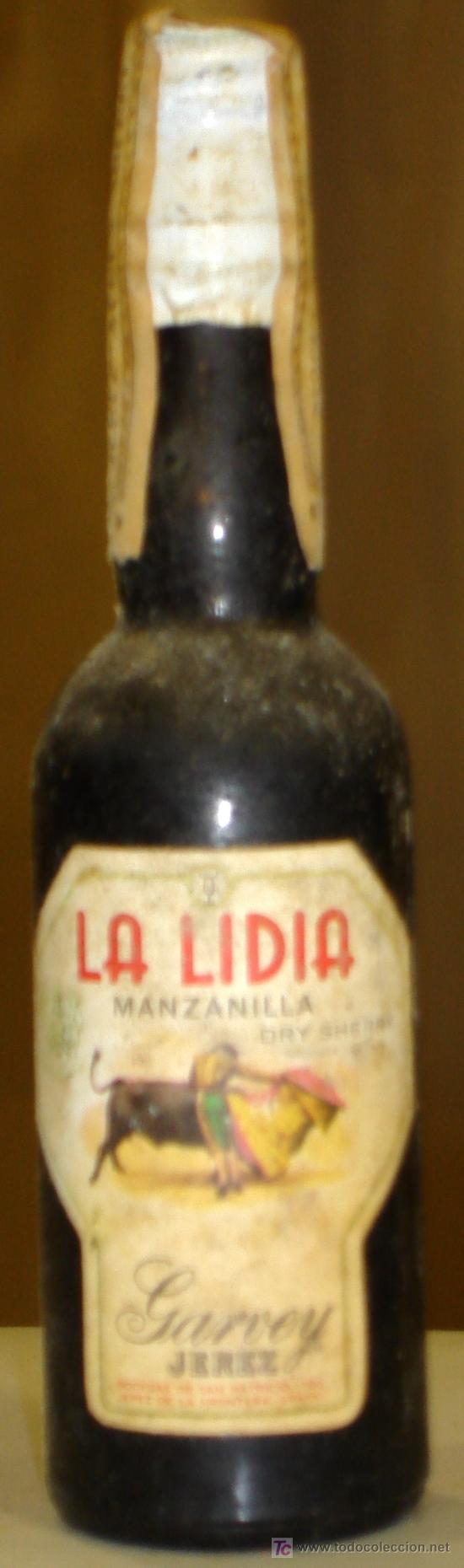 Botellas antiguas: BOTELLIN DE MANZANILLA LA LIDIA. GARVEY. - Foto 1