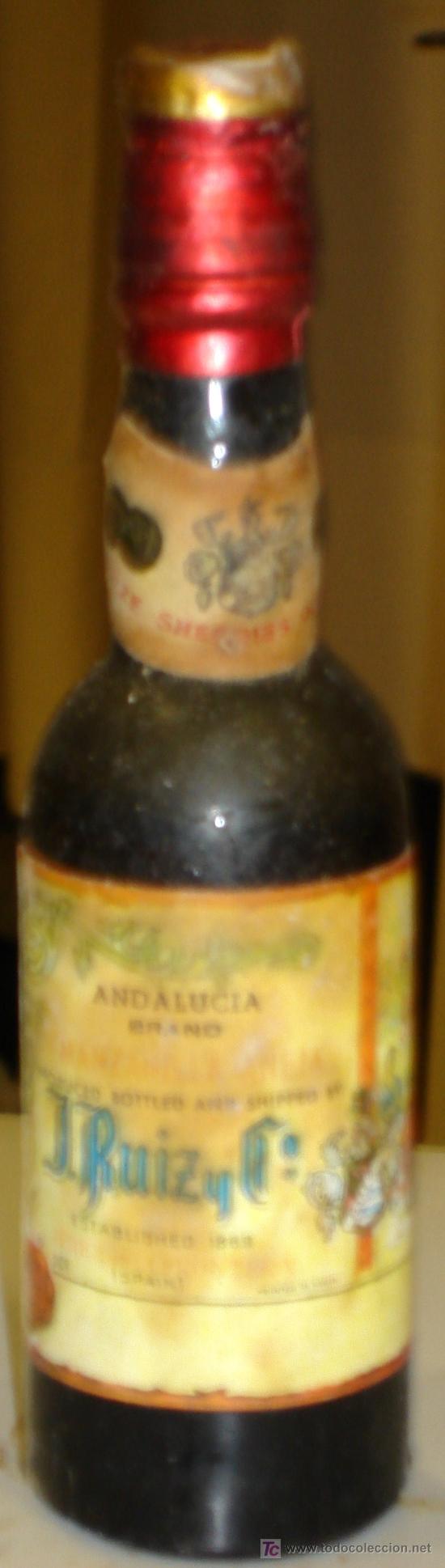 Botellas antiguas: BOTELLIN DE MANZANILLA. J. RUIZ Y COMPA&Ntilde;IA. - Foto 1