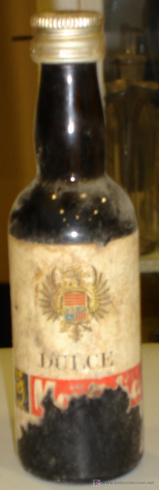Botellas antiguas: BOTELLIN DE DULCE MOTULIA. - Foto 1