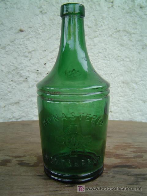 Botellas antiguas: BOTELLA MONASTERIO DE MONTSERRAT LETRAS EN RELIEVE - Foto 1