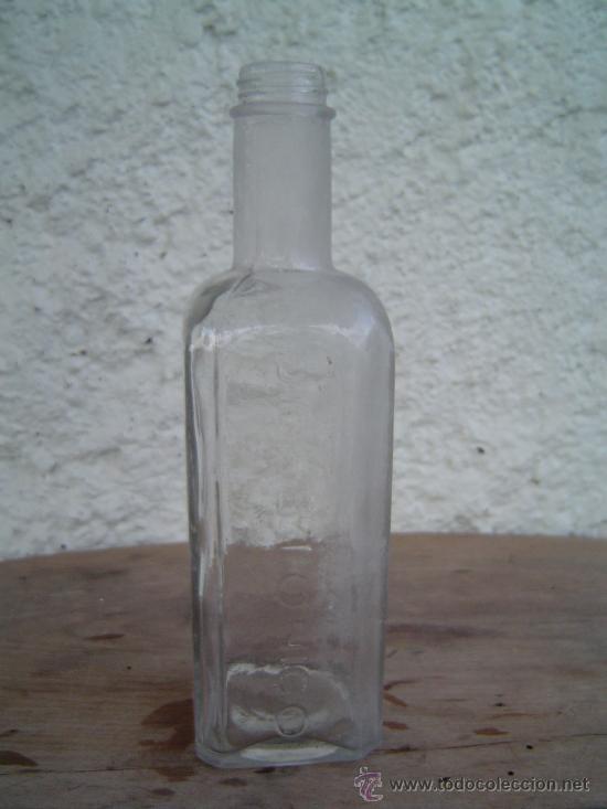 Botellas antiguas: BOTELLA DIGESTONICO RELIEVE - Foto 1