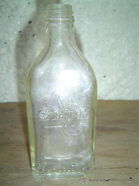 Botellas antiguas: BOTELLA LABORATORIO SEID RELIEVE - Foto 1