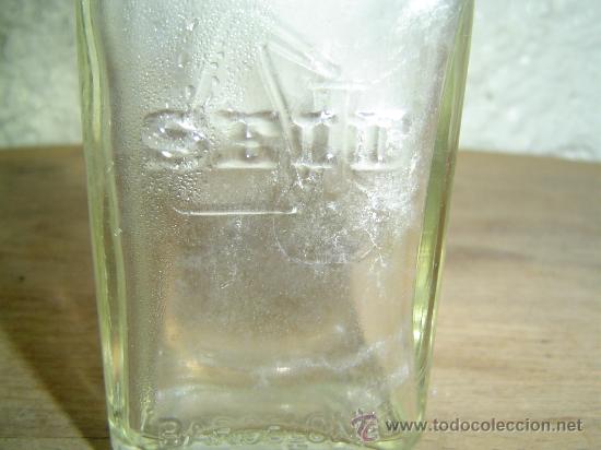 Botellas antiguas: BOTELLA LABORATORIO SEID RELIEVE - Foto 2