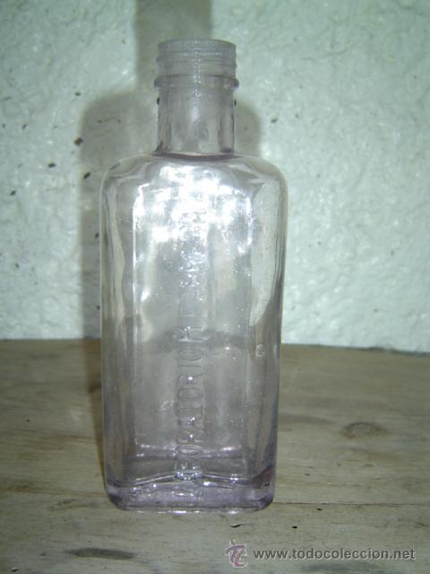 Botellas antiguas: BOTELLA LABORATORIO M. FABREGAT LETRAS EN RELIEVE - Foto 1