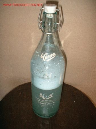 Botellas antiguas: botella de casera - Foto 1