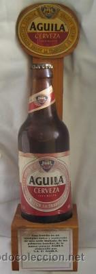 Botellas antiguas: CERVEZA EL &Aacute;GUILA, EJEMPLAR &Uacute;NICO Y NUMERADO - Foto 1