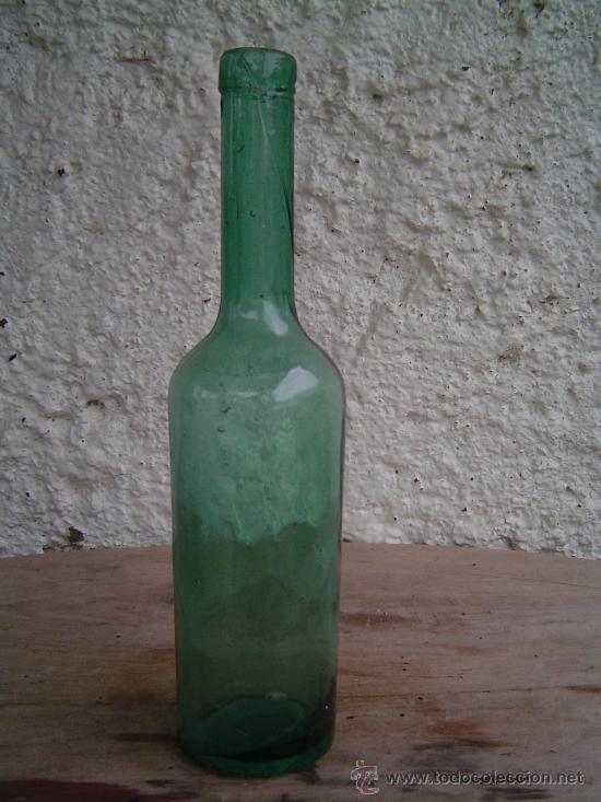 Botellas antiguas: BOTELLA YODARSOLO RELIEVE EN LA BASE - Foto 1