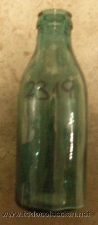 Botellas antiguas: Botella de leche de 20 cms de altura - Foto 1