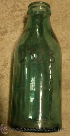 Botellas antiguas: Botella de leche de 20 cms de altura - Foto 1