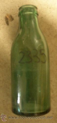 Botellas antiguas: Botella de leche de 20 cms de altura - Foto 1