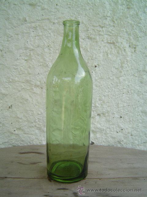 Botellas antiguas: BOTELLA DE TERRY RELIEVE - Foto 1