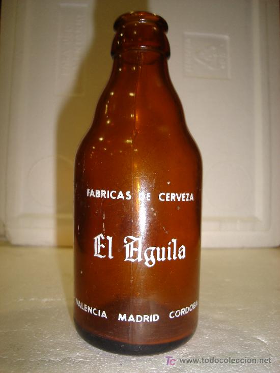 Botellas antiguas: BOTELLIN DE CERVEZA EL AGUILA - Foto 1