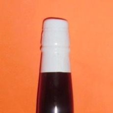 Botellas antiguas: BOTELLA DE VINO FINO PAQUIRO. PRODUCE JUAN GONZALEZ SILLERO, S.A. JEREZ DE LA FRA. CÁDIZ. ESPAÑA.