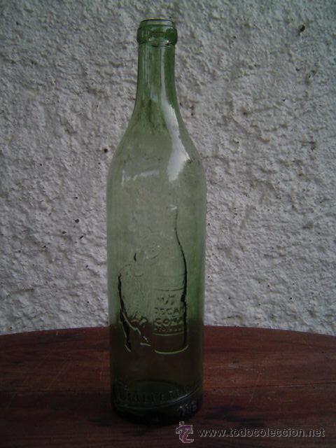 Botellas antiguas: BOTELLA CO&Ntilde;AC CABALLERO LETRAS EN RELIEVE - Foto 1