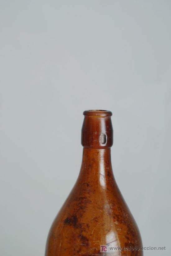 Botellas antiguas: Botella cerveza El Le&oacute;n. - Foto 4