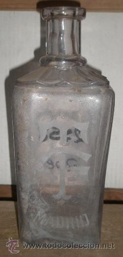 Botellas antiguas: Botella marcada TG Madrid - Foto 1