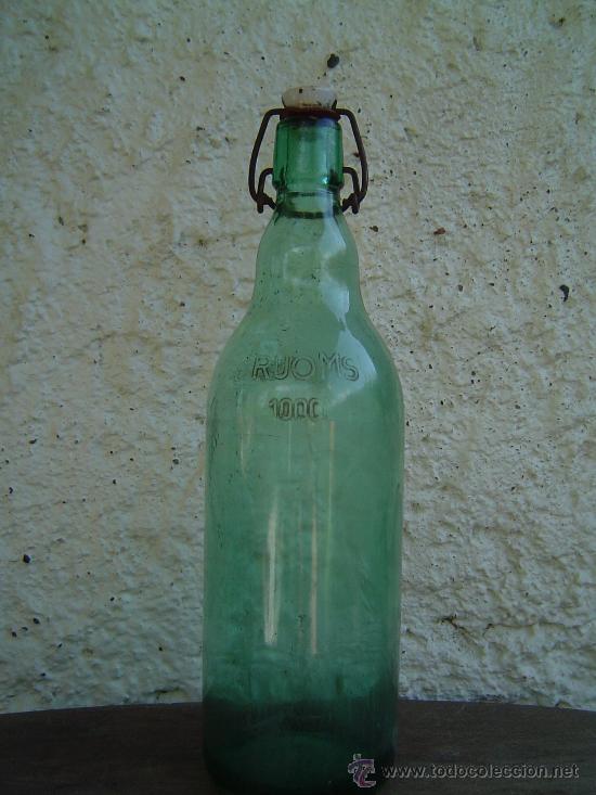 Botellas antiguas: BOTELLA RUOMS LETRAS EN RELIEVE - Foto 1