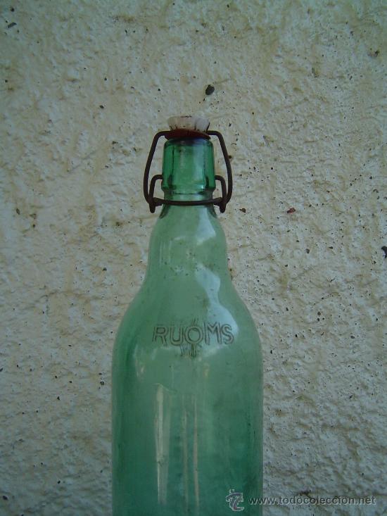 Botellas antiguas: BOTELLA RUOMS LETRAS EN RELIEVE - Foto 3