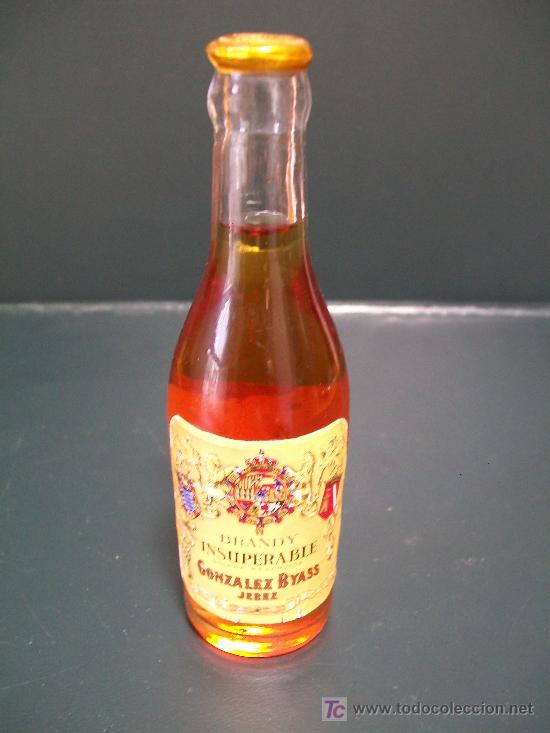 Botellas antiguas: Brandy Insuperable Botellin - Foto 1
