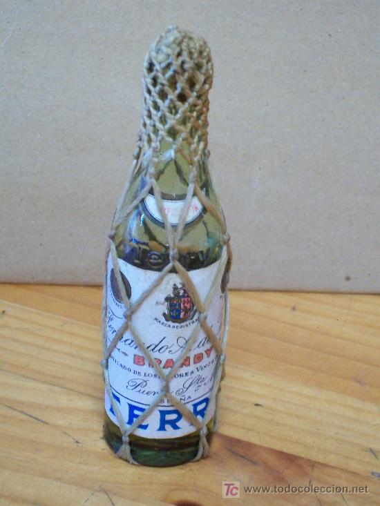 Botellas antiguas: BOTELLIN DE BRANDY VIEJO TERRY - Foto 1