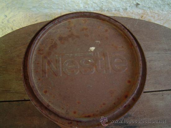 Botellas antiguas: ANTIGUA LATA NESTLE - Foto 1