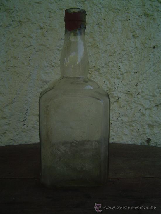 Botellas antiguas: BOTELLA. S.A. PUJOL Y GRAU LETRAS EN RELIEVE - Foto 1