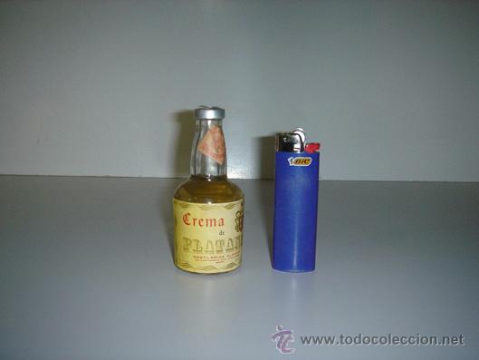 Botellas antiguas: botellin de crema de platano - Foto 1