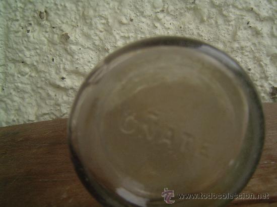 Botellas antiguas: BOTELLA O&Ntilde;ATE LETRAS EN RELIEVE EN LA BASE - Foto 2