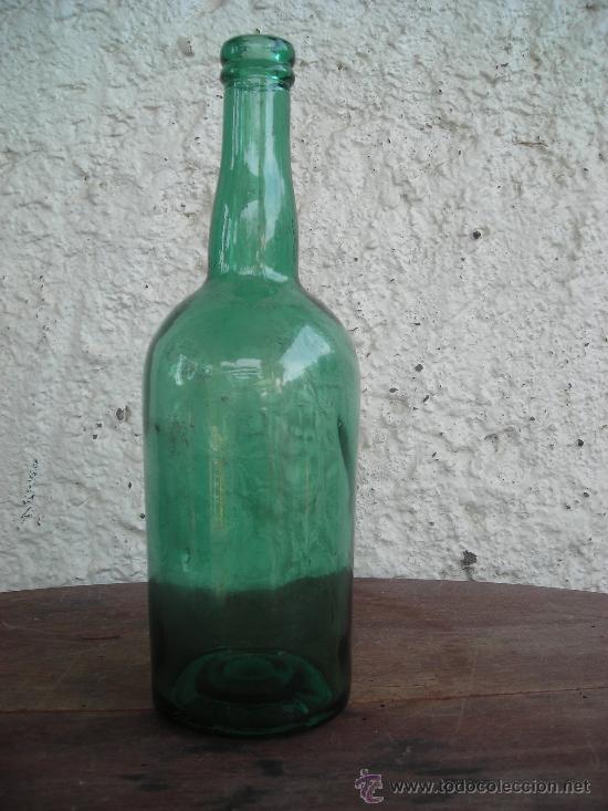 Botellas antiguas: BOTELLA JEREZ LETRAS EN RELIEVE EN LA BASE - Foto 1
