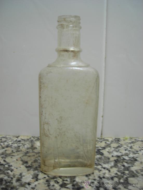 Botellas antiguas: BOTELLA  GENOVEJ  LETRAS EN RELIEVE - Foto 1