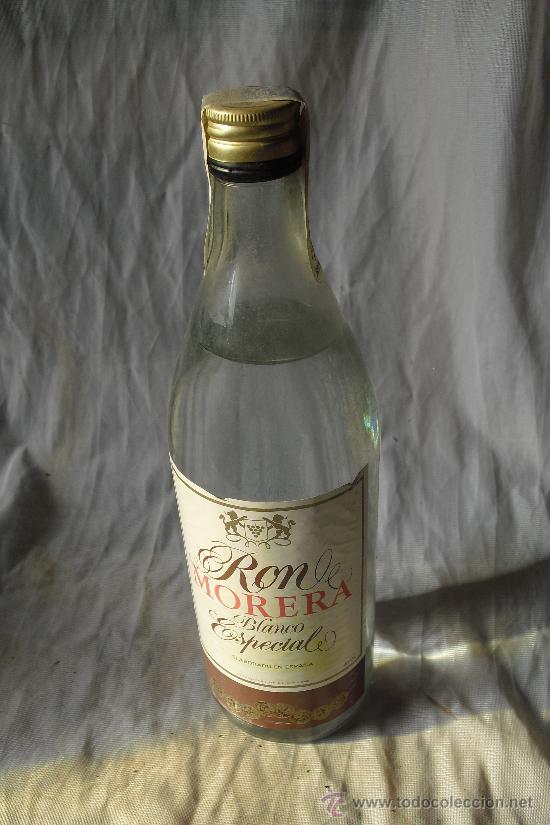 Botellas antiguas: botella de ron con precinto 8 pts. (colecci&oacute;n) - Foto 1