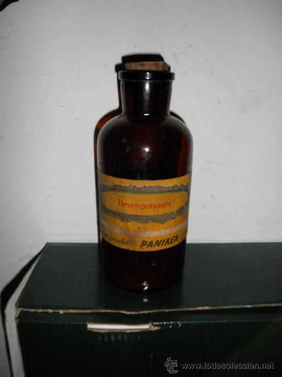 Botellas antiguas: botella de cristal de desengrasante casa paniker - Foto 1