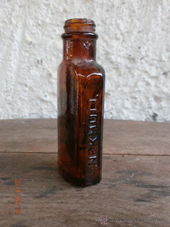 Botellas antiguas: BOTELLA NEKMULL LETRAS EN RELIEVE - Foto 1