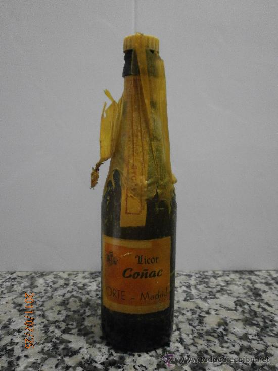 Botellas antiguas: BOTELLA LICOR CO&Ntilde;AC. LIQUIDO NO ORIGINAL ORTE - MADRID - Foto 1